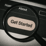 Magnifying glass focusing on a website interface button labeled ‘Get Started’